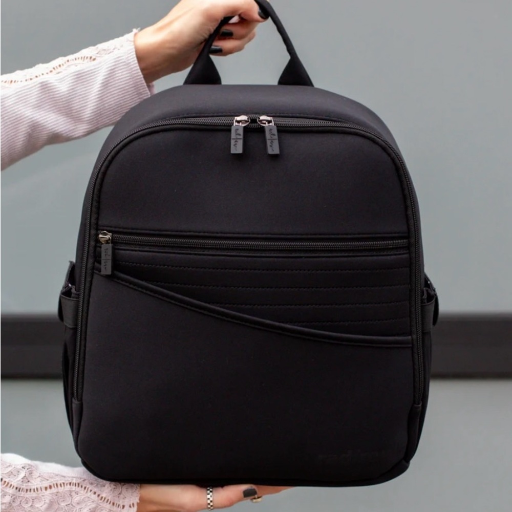 Brand new Rad Revolution / Rad Rev shop black neoprene backpack